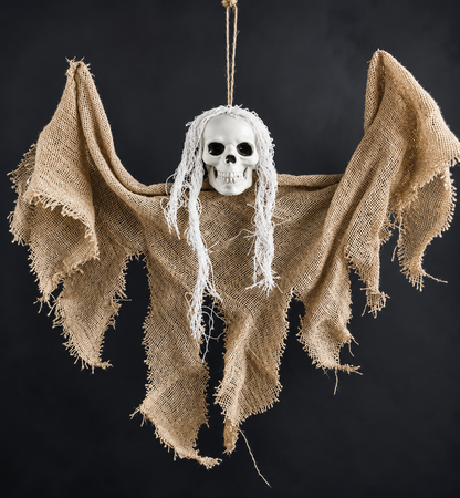 Close-up detail of hanging Halloween skull decoration