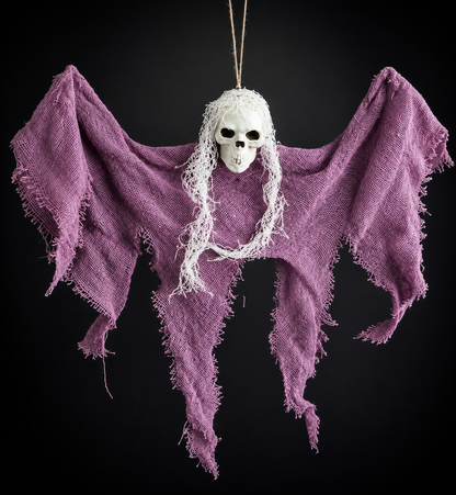 Halloween skull decoration hung outdoors as spooky yard decor